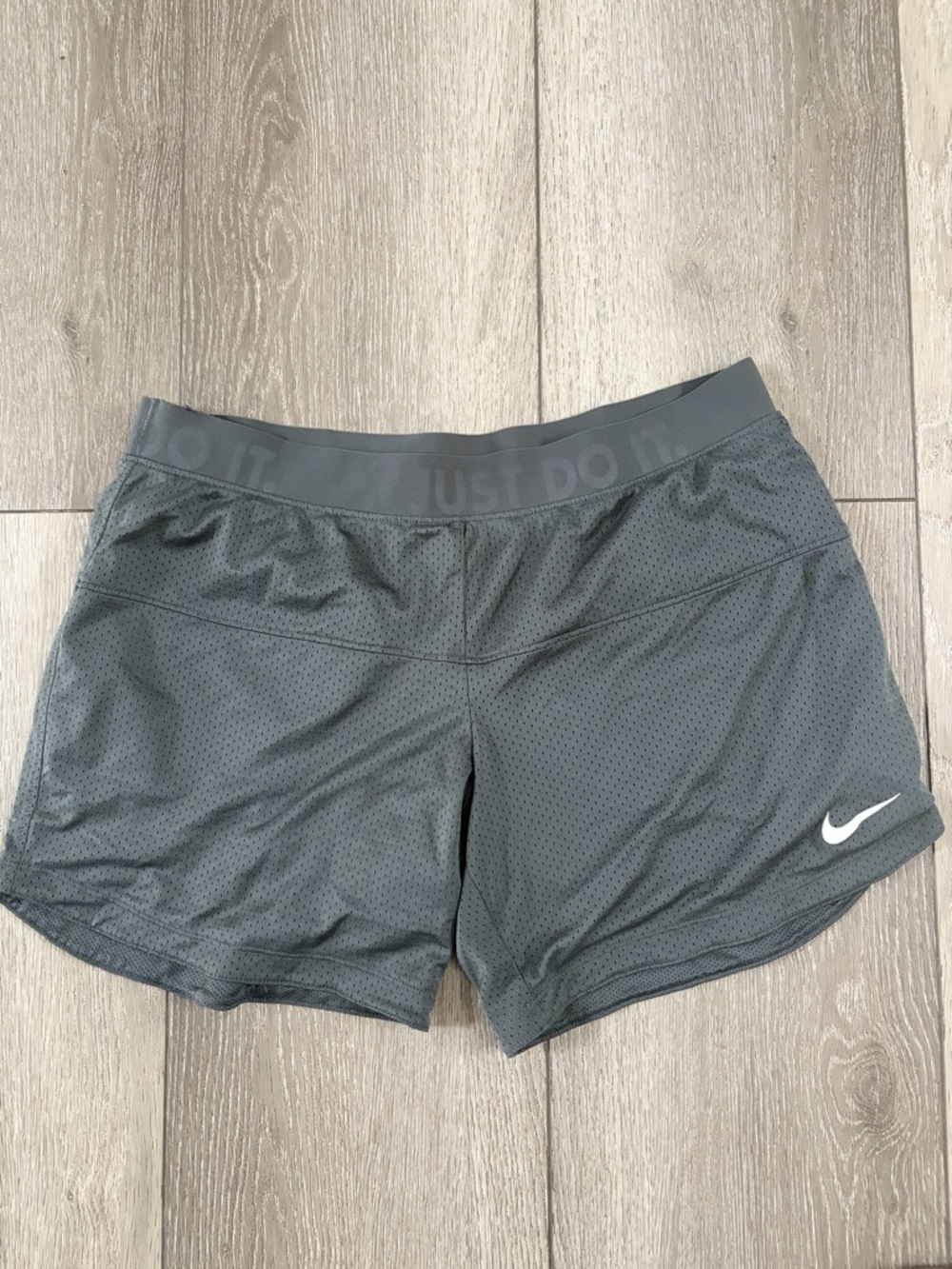 Nike Women’s Dark Gray Athletic Mesh Shorts with White Swoosh
